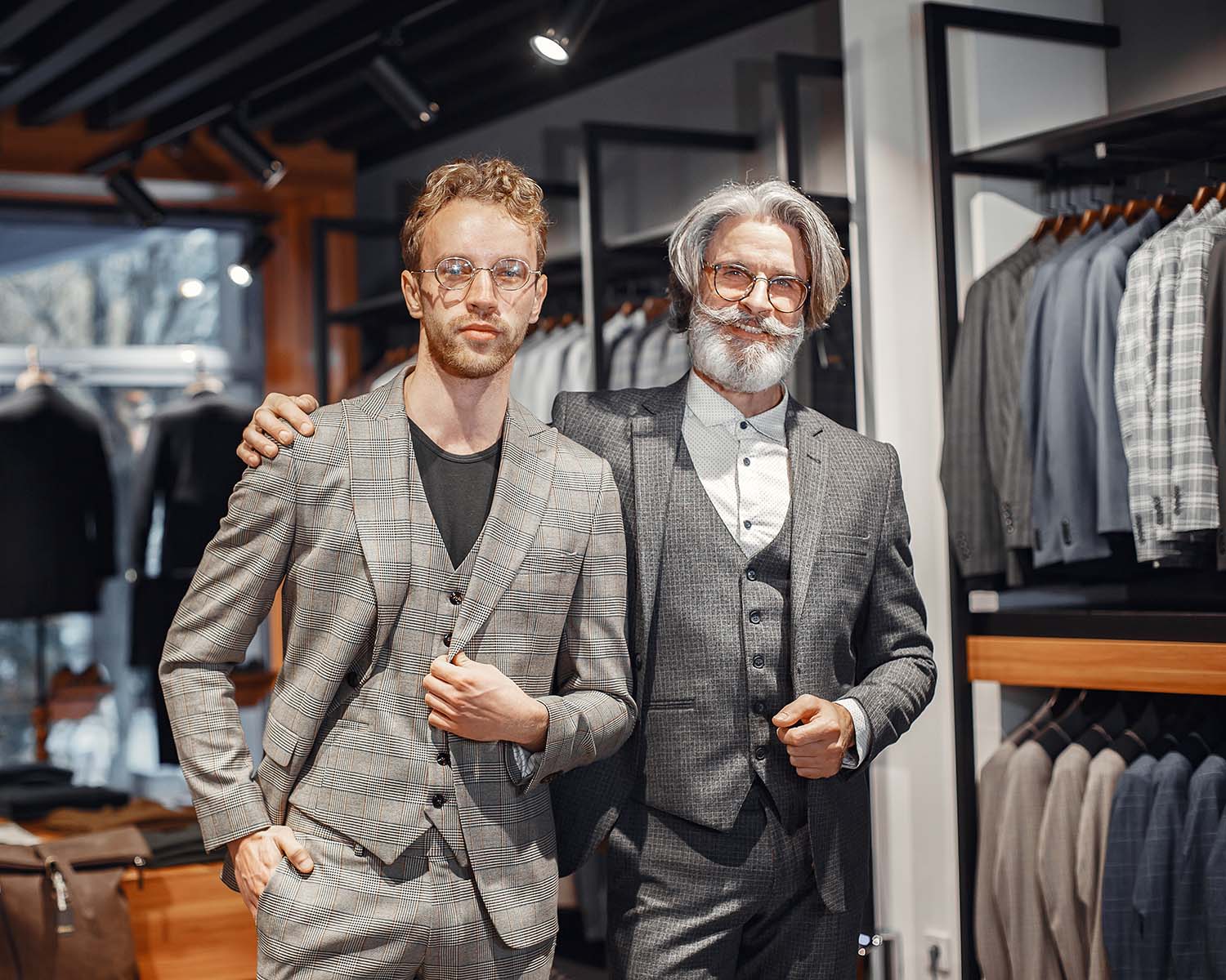 senior-man-choosing-a-new-suit-in-a-store-3GQ32F8.jpg